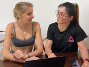 A Woman in Singapore Receiving Guidance from a Nutrition Coach of Athleaders